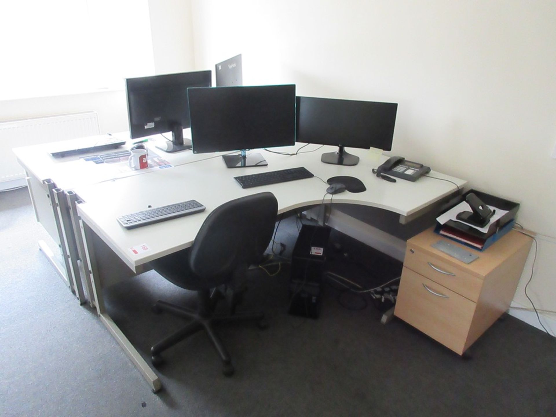 Two grey laminate L shaped office desks