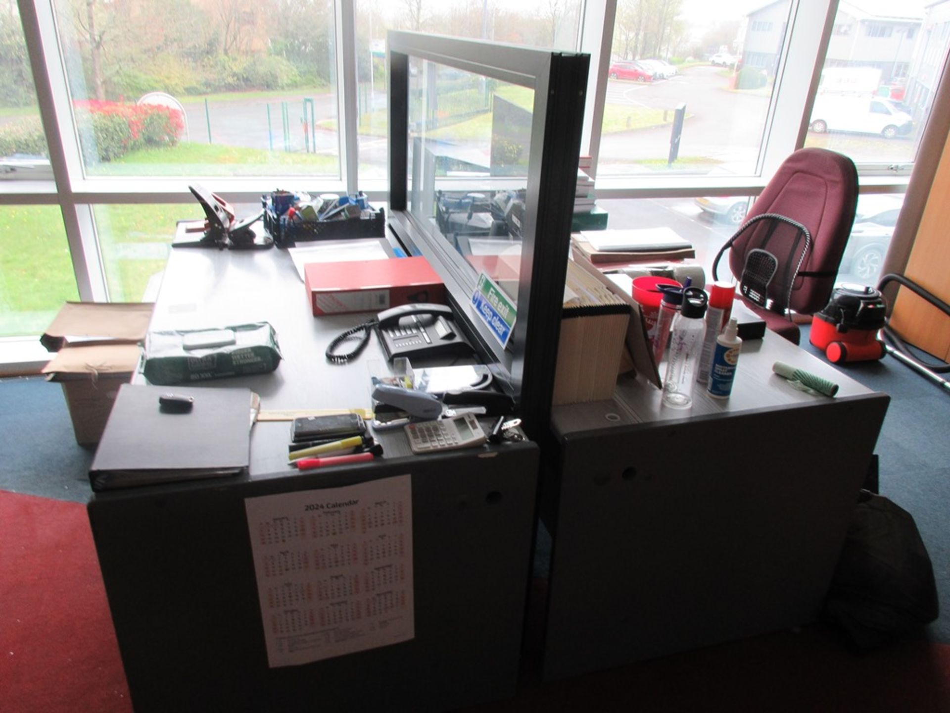 Two grey laminate office desks