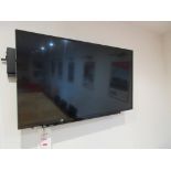 Toshiba wall mounted flat screen television with remote