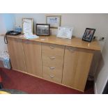 Light wood triple door, 4-drawer sideboard