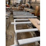 Five various steel frame workbenches