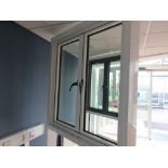 Aluminium framed twin door showroom window