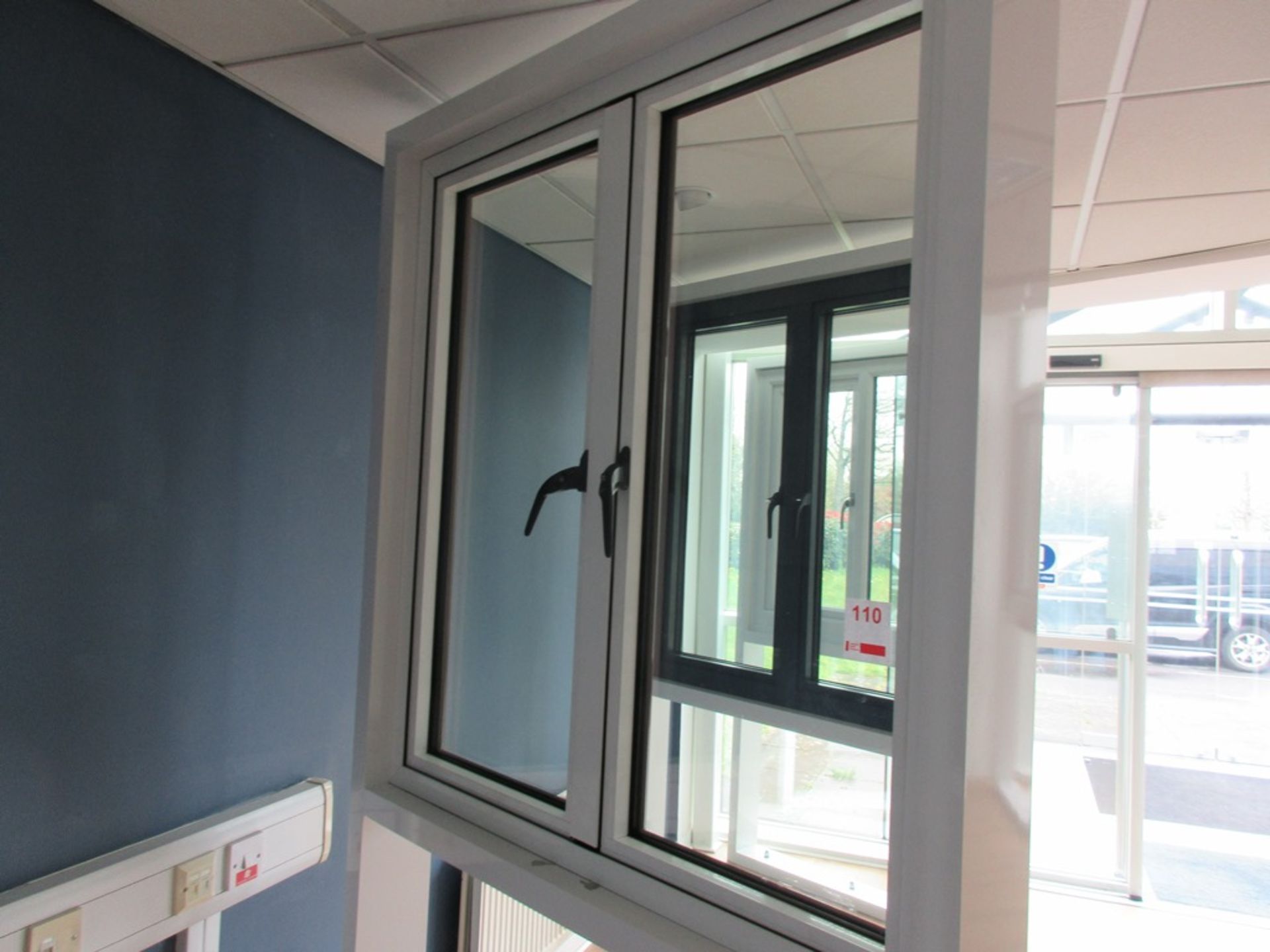 Aluminium framed twin door showroom window