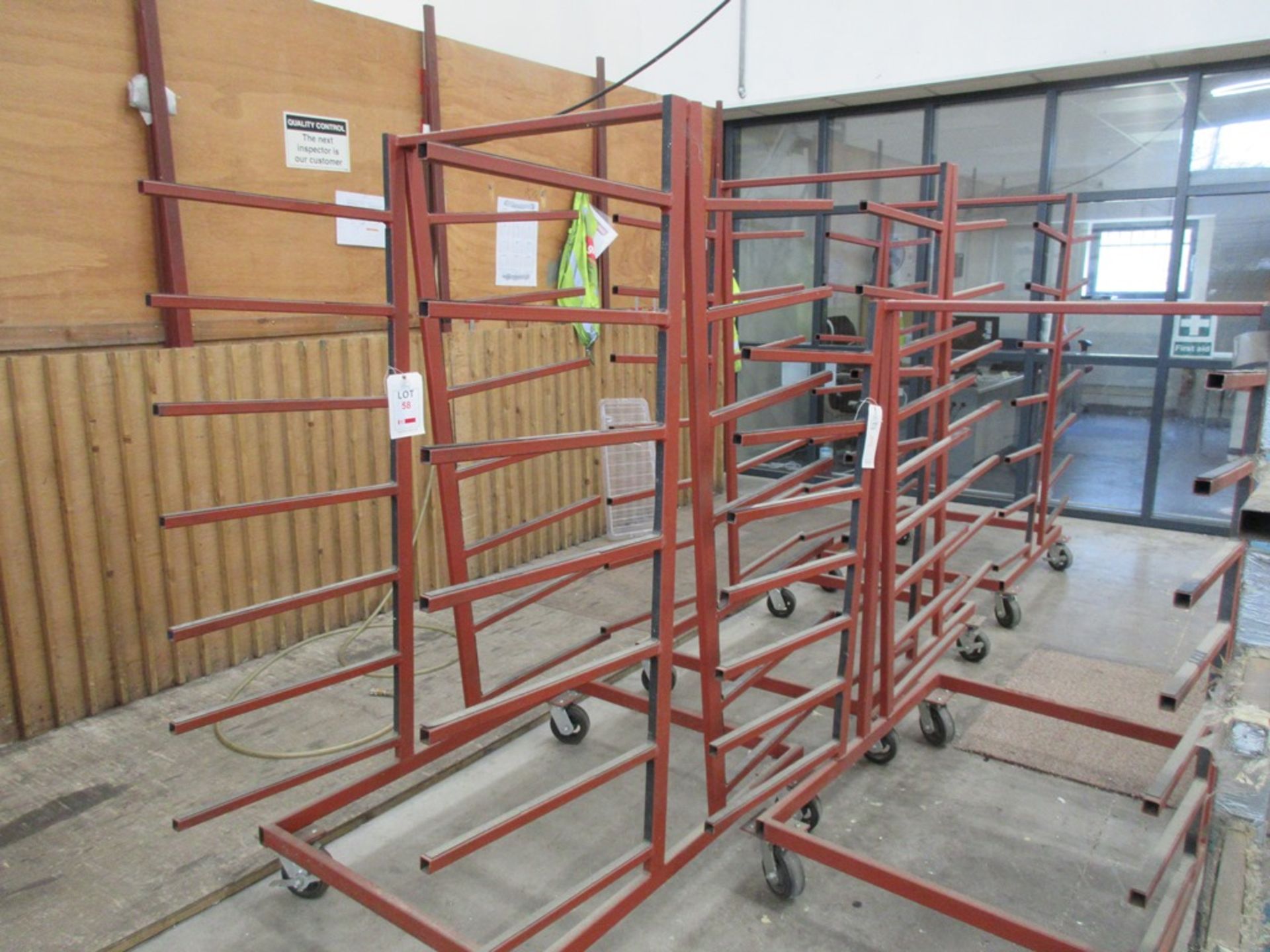 Four assorted A frame mobile stock trollies