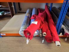 Contents of shelf to include 8 rolls of various coloured fabrics