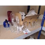 Assortment of various glass decanters