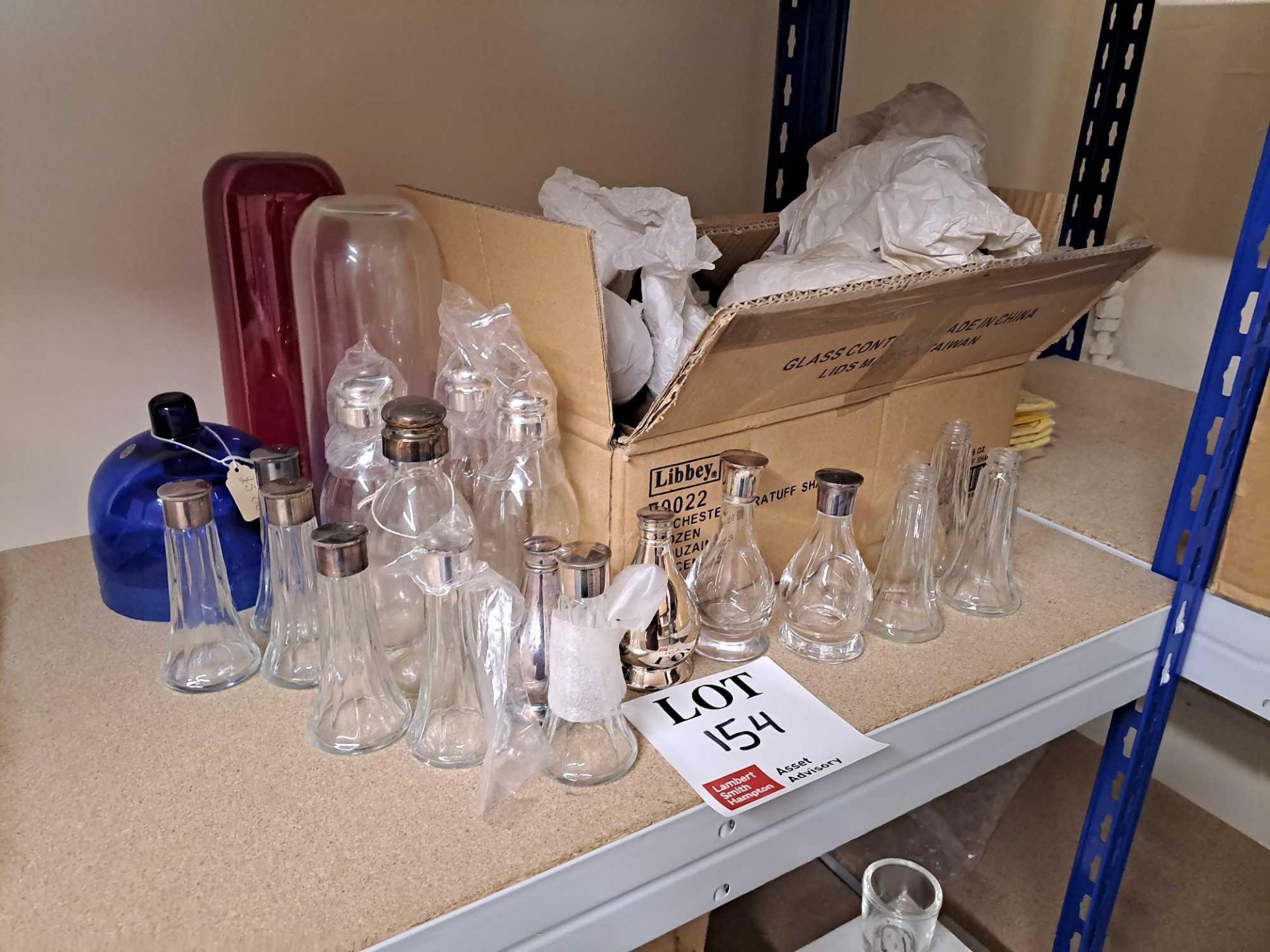 Assortment of various glass decanters