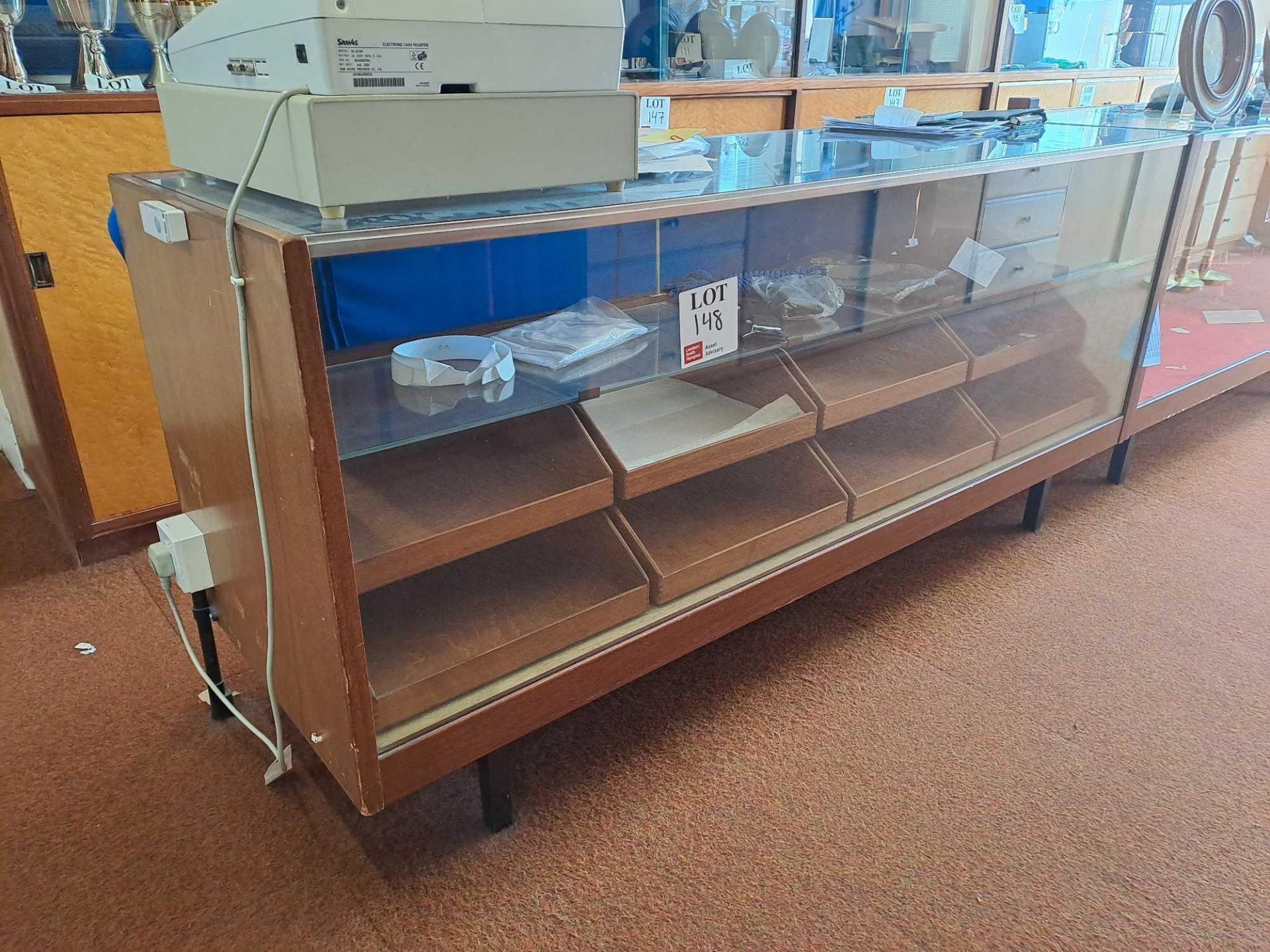 Three wooden framed, glass fronted, shop display units