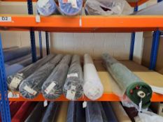 Contents of shelf to include 6 rolls of various coloured fabric