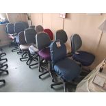 Fourteen upholstered wheeled office chairs