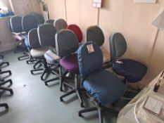 Fourteen upholstered wheeled office chairs