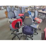 Thirteen upholstered wheeled office chairs