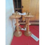 Four oak candlestick holders