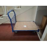 Blue metal wheeled trolley