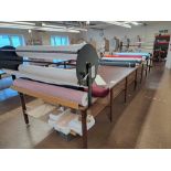 Large textile cutting table and 2 fabric roll dispensers
