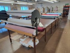 Large textile cutting table and 2 fabric roll dispensers