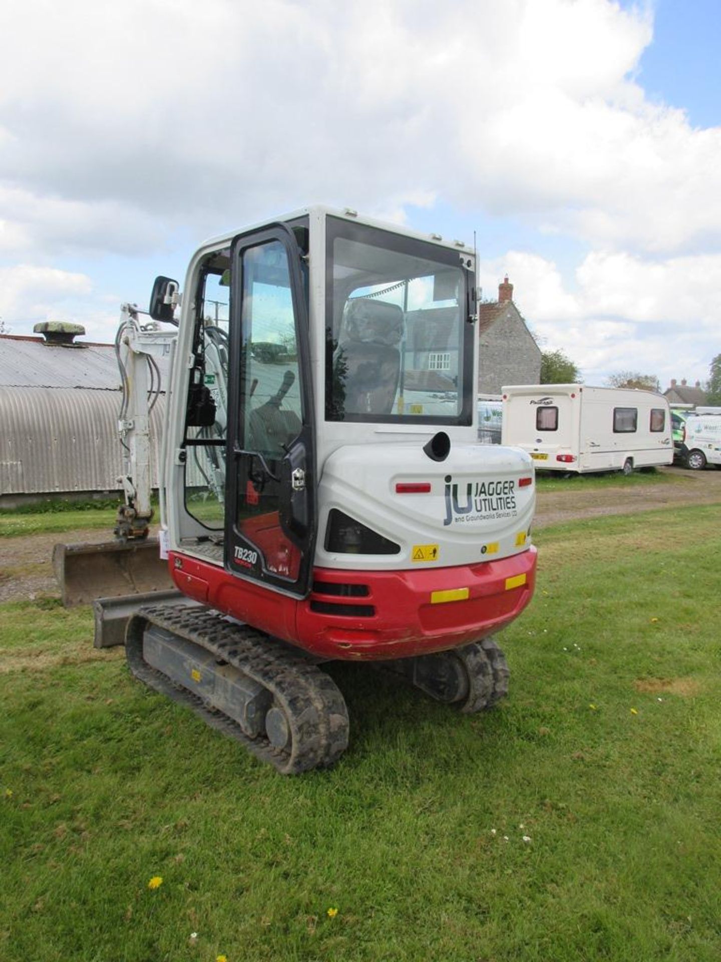 Takeuchi TB230 rubber tracked compact mini digger (2023) - Image 4 of 11