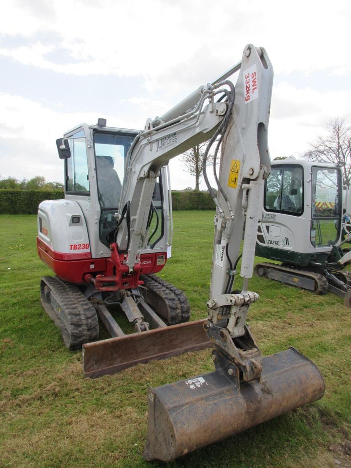 Takeuchi TB230 rubber tracked compact mini digger (2023) - Image 2 of 11