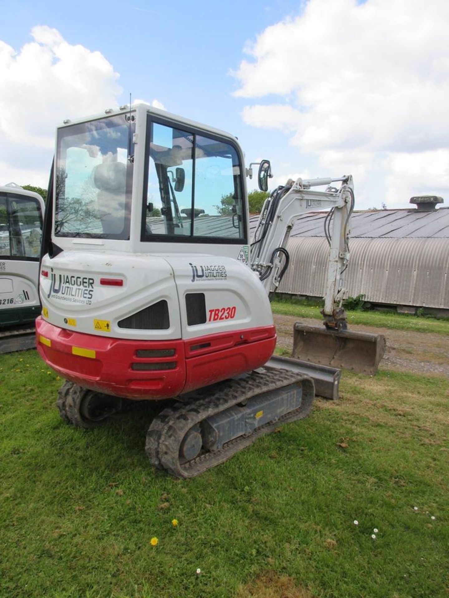Takeuchi TB230 rubber tracked compact mini digger (2023) - Image 3 of 11