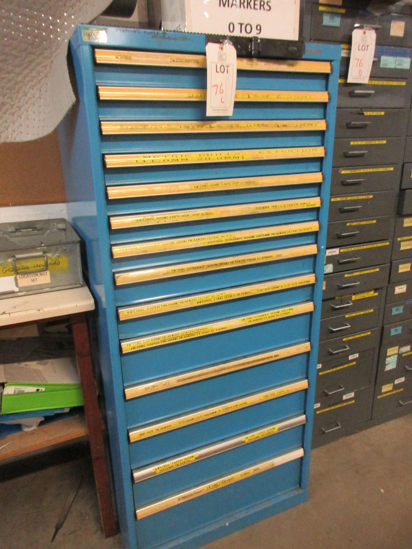 Metal 14 drawer tool cabinet, 720 x 720 x height 1630mm, with contents including carbide drill,