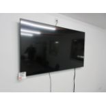 Samsung wall mounted TV, approx 60"