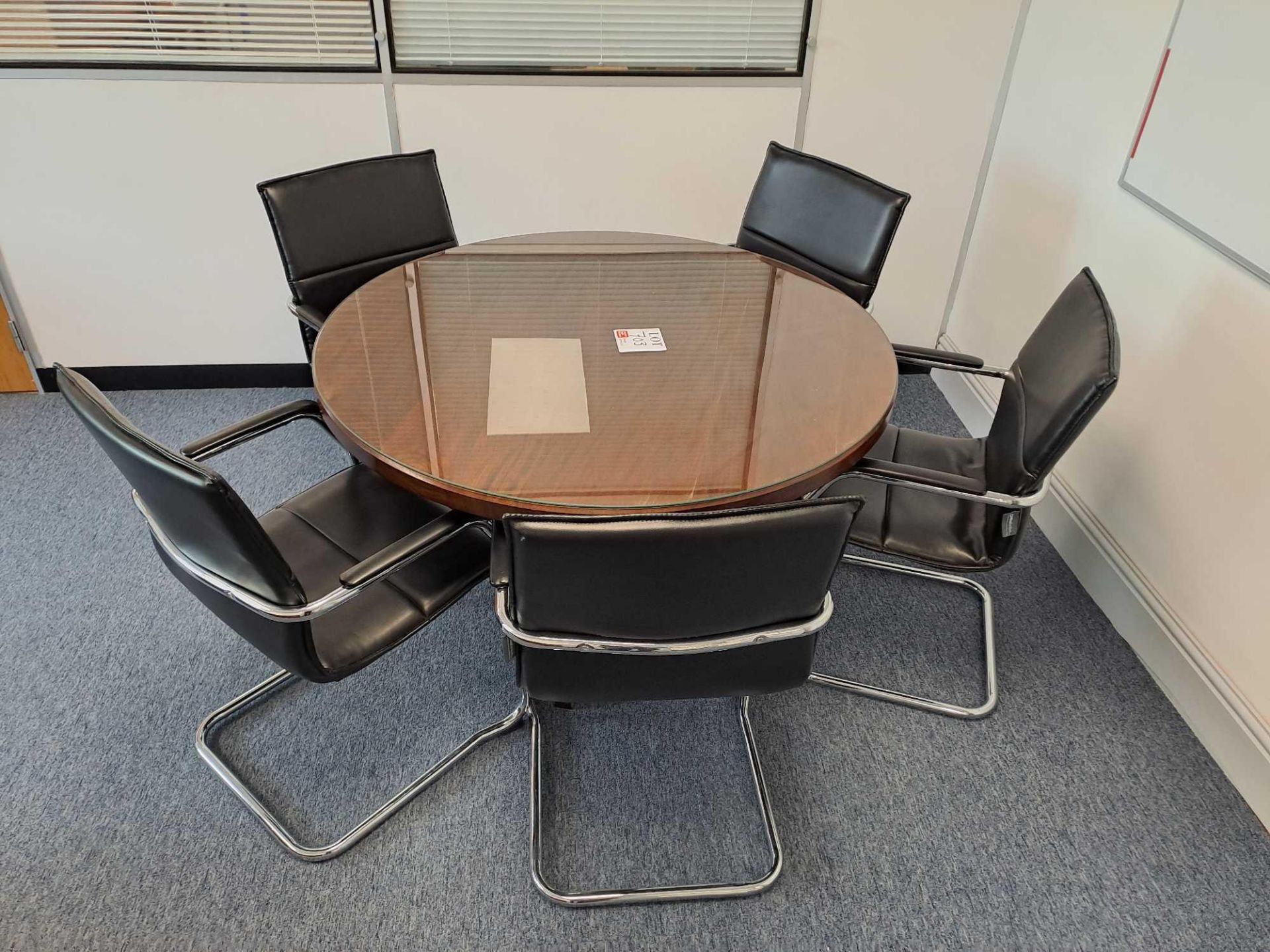 Circular glass topped wooden table, five black leather effect chairs - Image 2 of 3