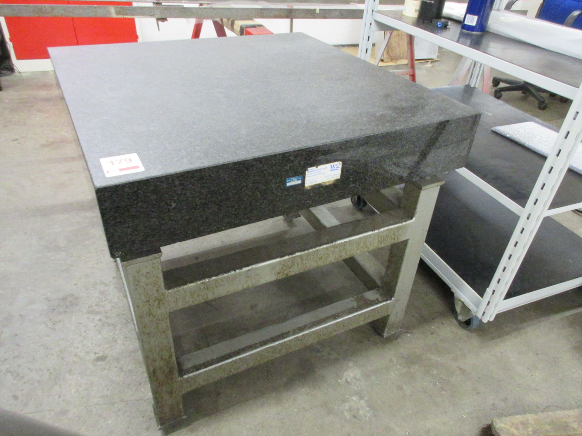 Granite surface table, 3' x 3', mounted on stand