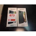 Two Samsung Galaxy A12 phones (boxed, used, no chargers)