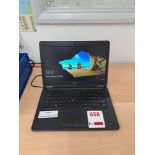 Dell Latitude E7450 laptop with charger
