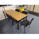 Wood effect table and five black chairs