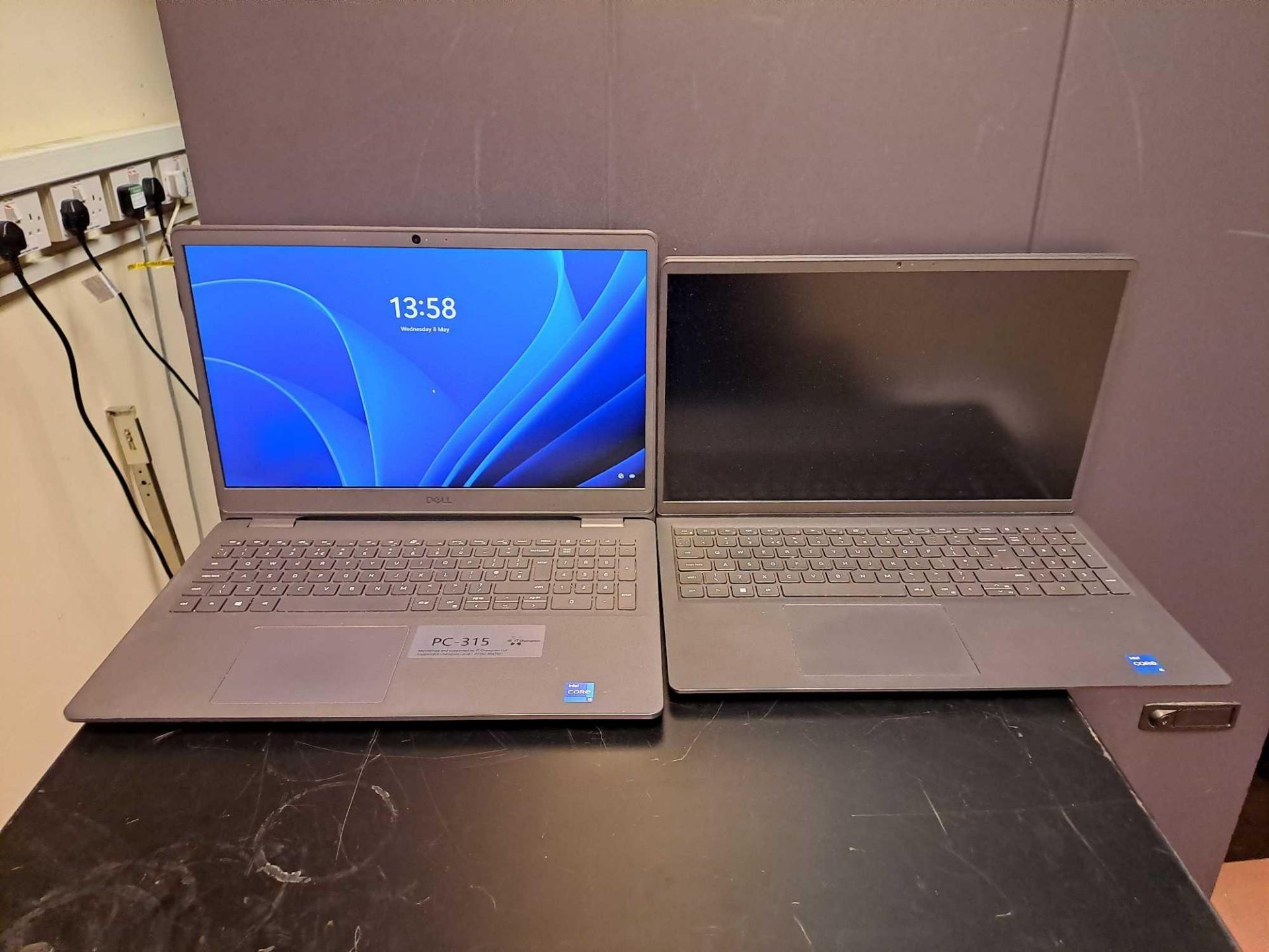 Two Dell laptops (1 x Vostro, 1 x Inspiron)