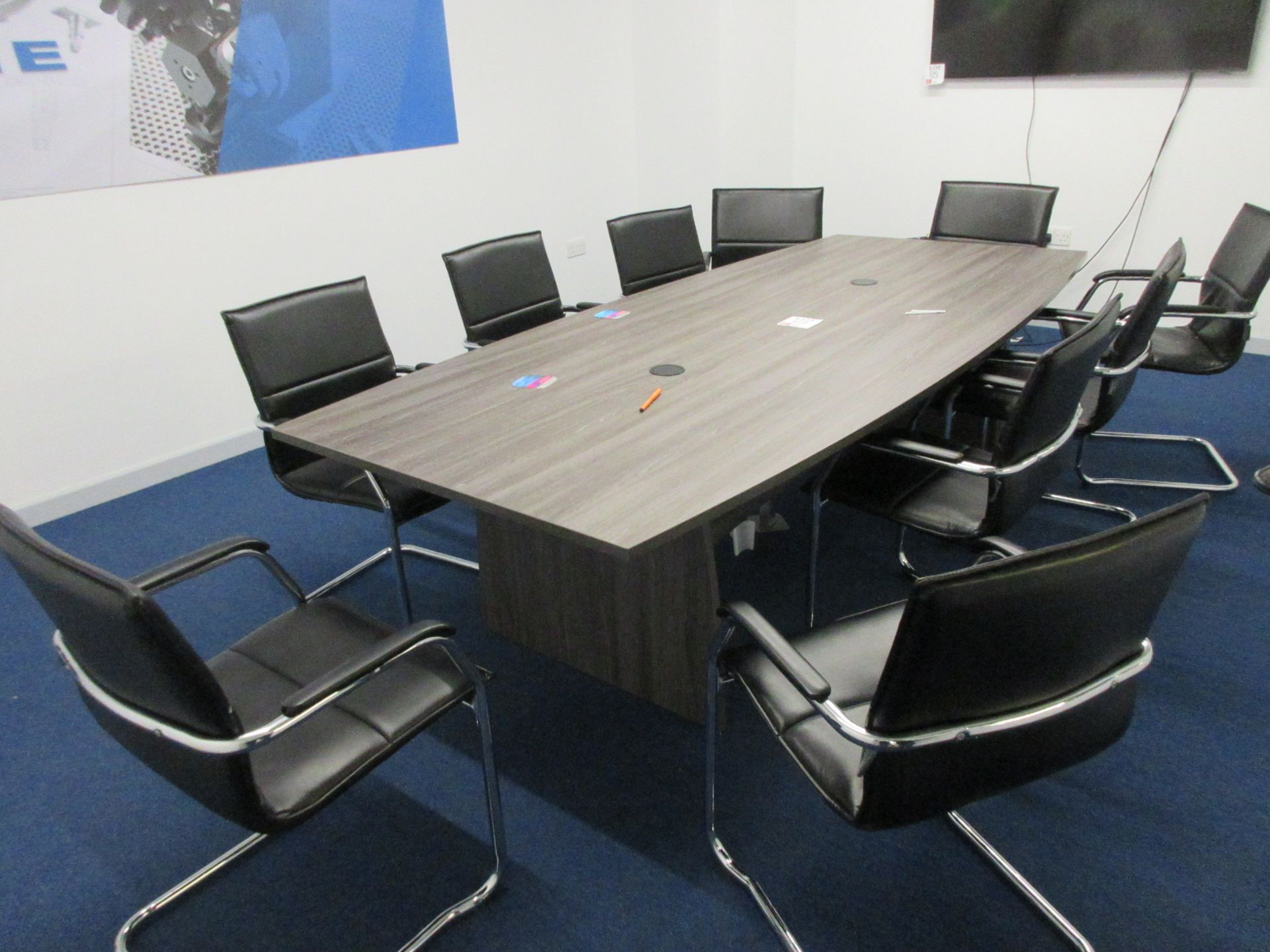 Dark wood effect boardroom table, 10 black leather effect chairs