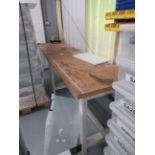 Two metal frame/timber top workbenches, 1.5m x 750mm