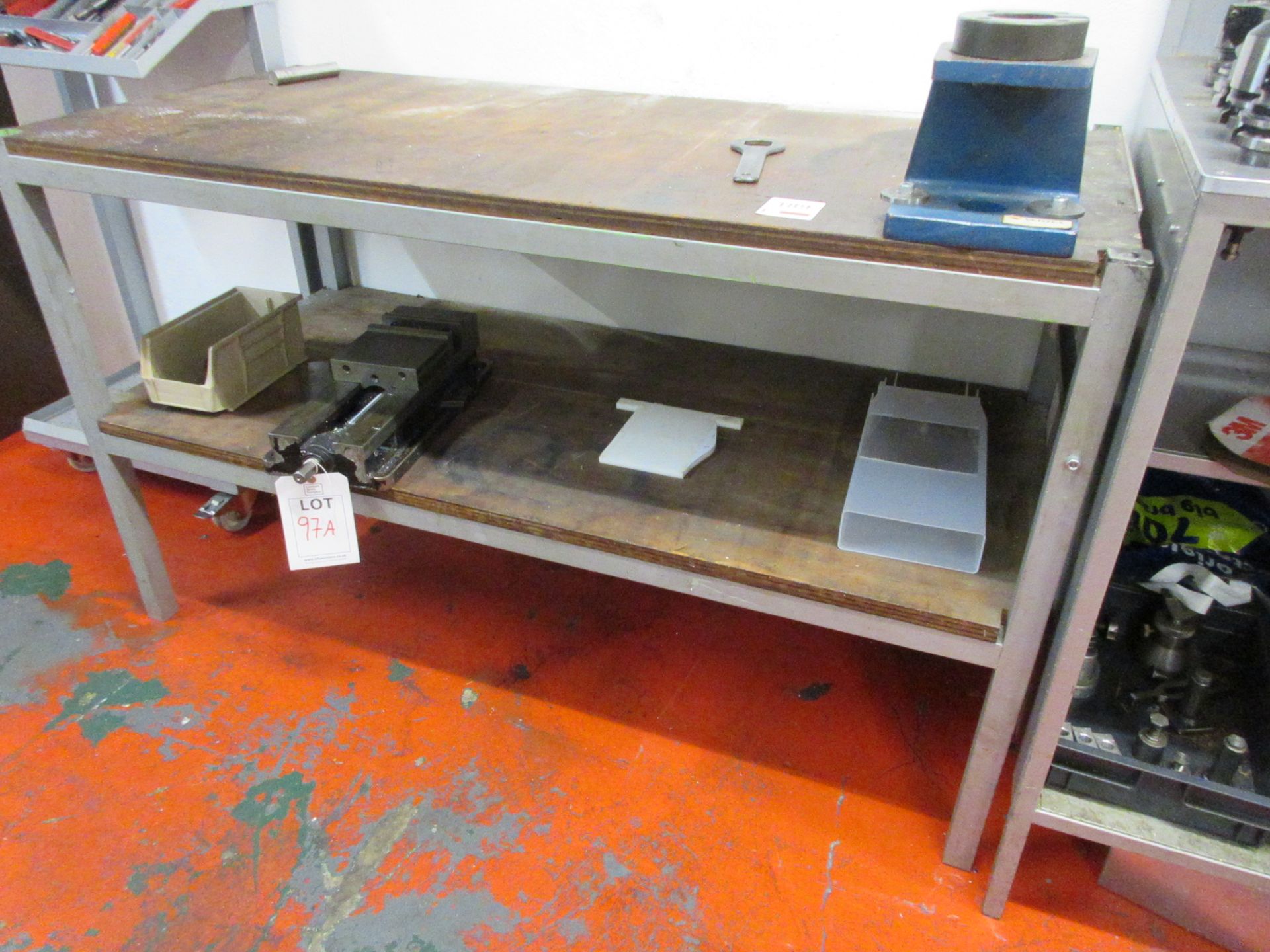 Two metal frame workbenches 1 x 1540 x 700mm and 1 x 1.8m x 830mm