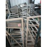 Four metal frame single sided racks, 1300 x 450mm, with quantity of tote pans