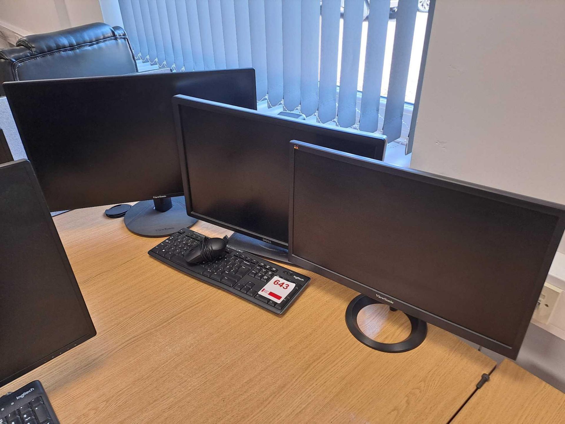 Two Viewsonic monitors, one Dell monitor with keyboard & mouse