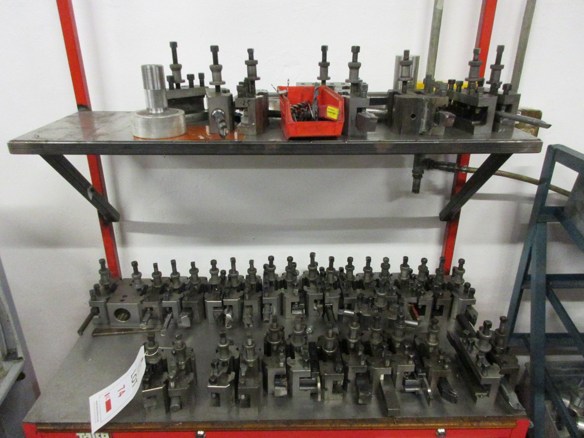 Quantity of various tool posts with associated attachments, including drill bits, cutting tools,