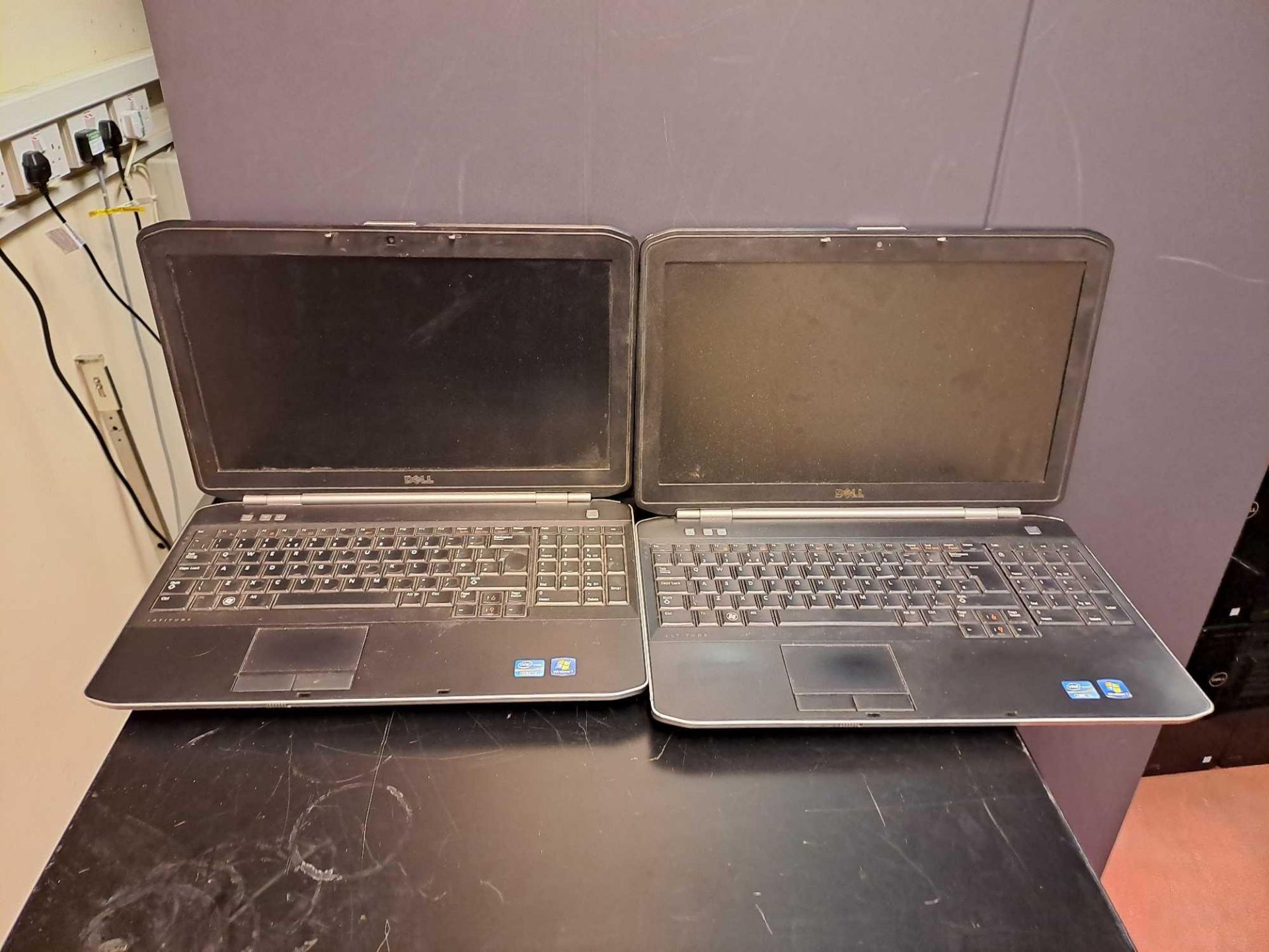 Two Dell Latitude laptops (working condition unknown)