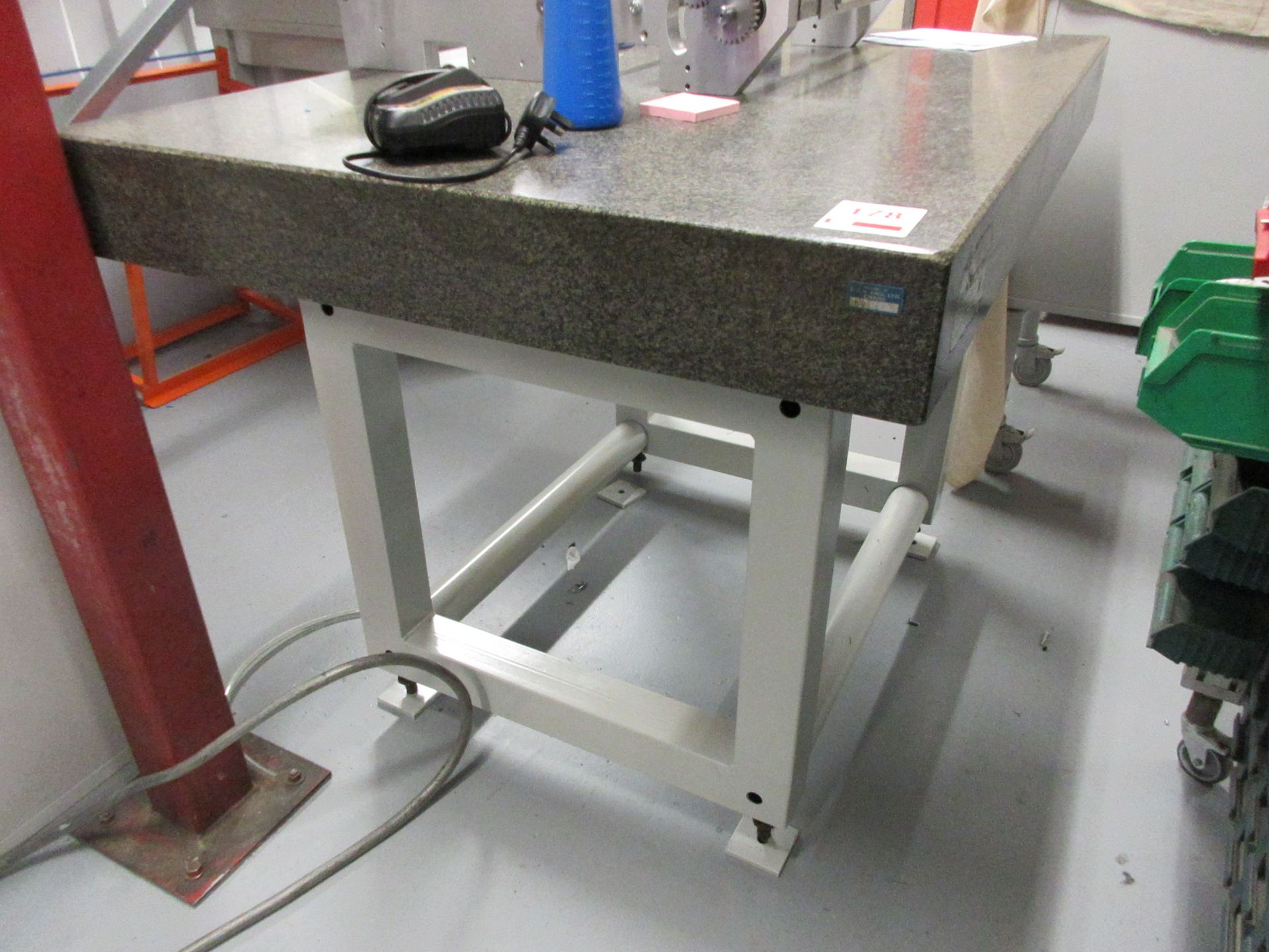 Granite surface table, 4' x 3', mounted on stand