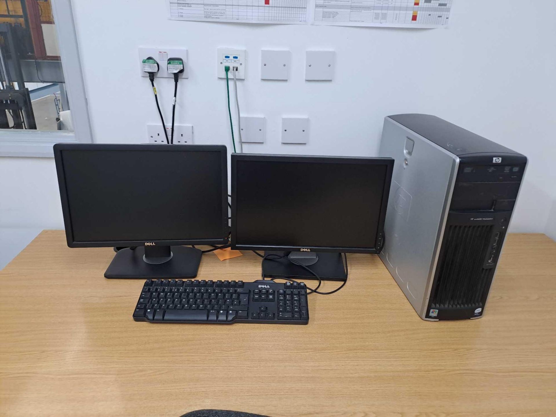 Two Dell monitors, one HP XW6600 workstation PC, one keyboard