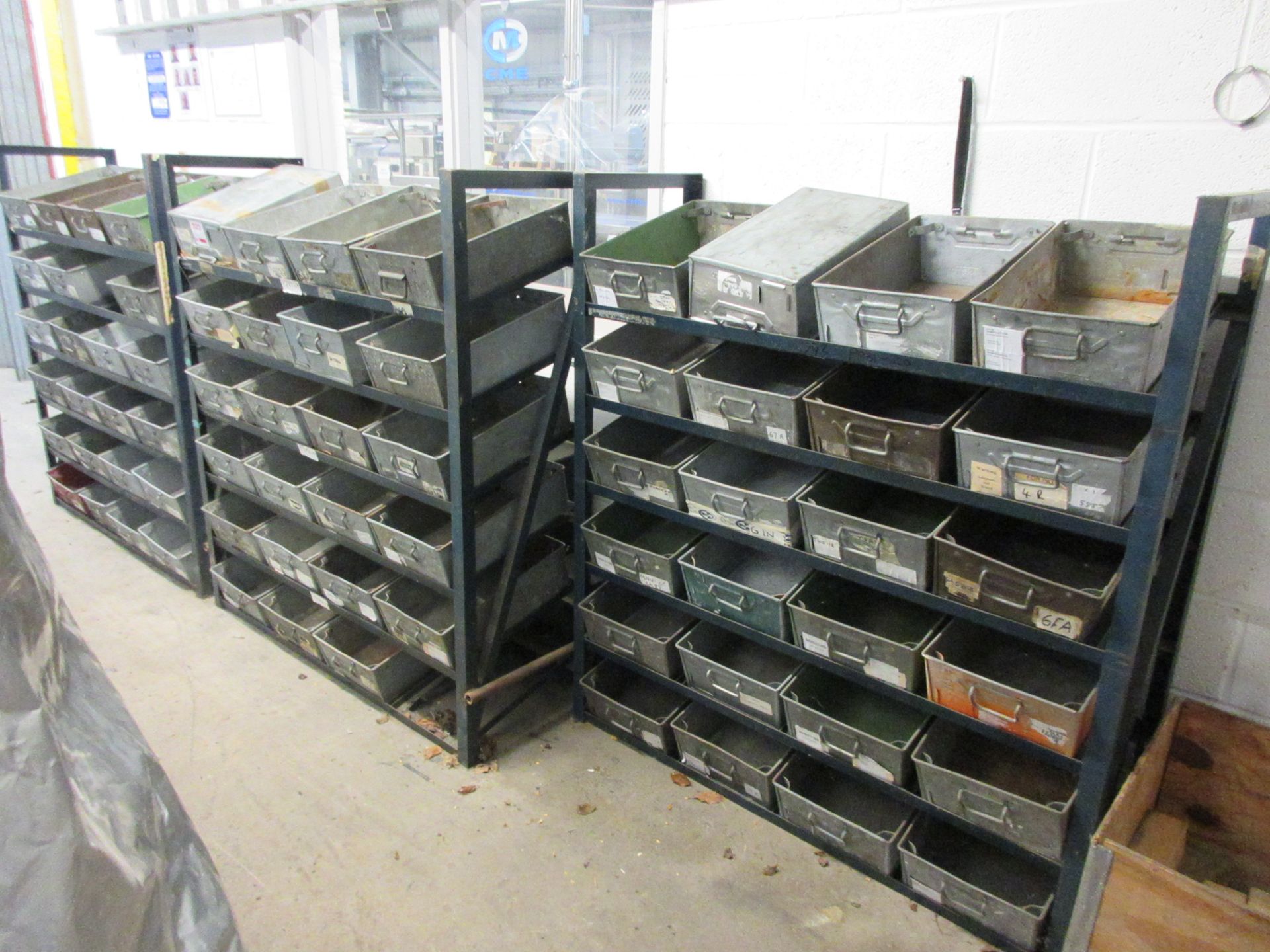 Three metal frame single sided storage racks, 1350 x 450 x 1480mm, with quantity of tote pans