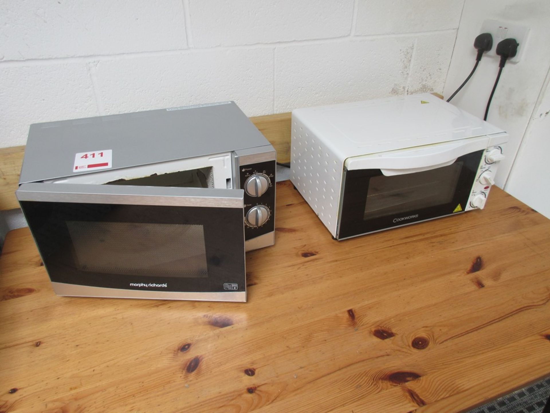 Two assorted microwaves