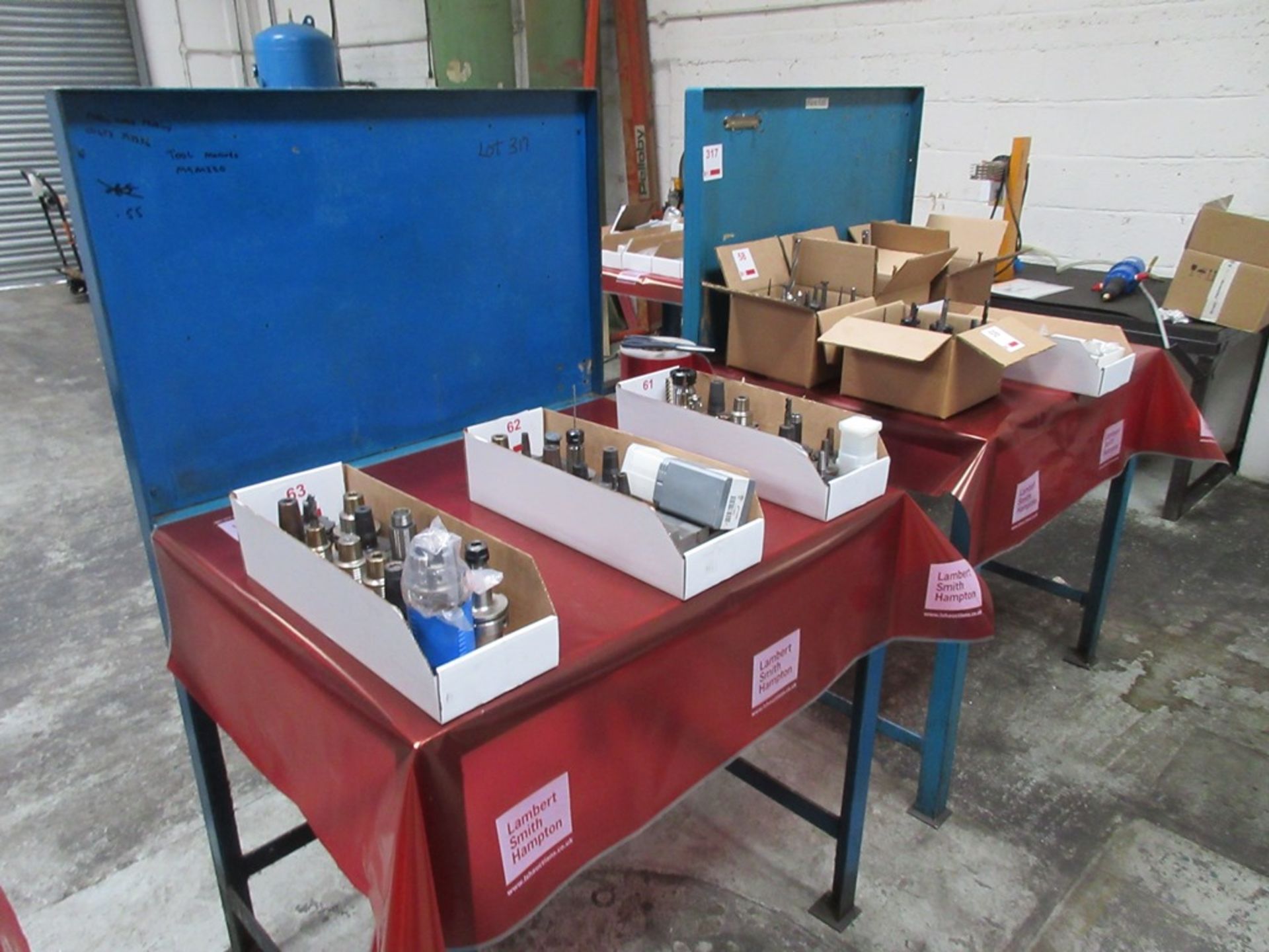 Two metal frame workbenches