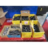 Seven boxes of assorted nuts, bolts & clamps