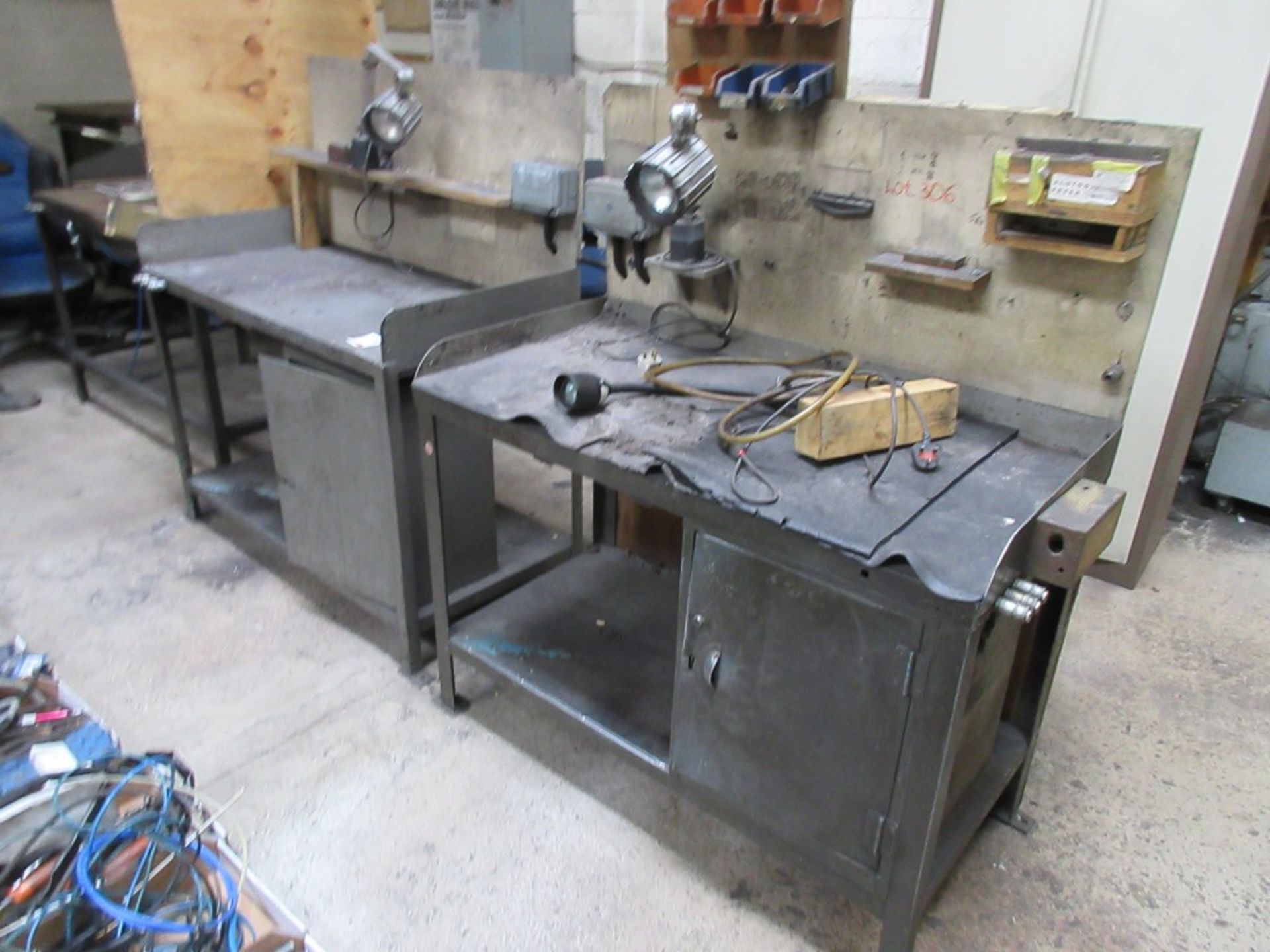 Two metal frame workbenches