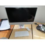 Apple iMac with keyboard, mouse