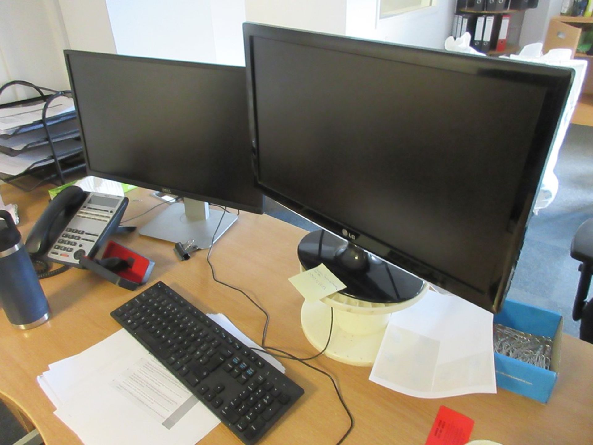 Un-named computer system with 2 flat screen monitors, keyboard, mouse