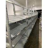 Twenty bays of gravity slide modular racking bays