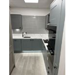 L shape laminate kitchen carcus with 7 cupboards, 4 drawers, Minerva stone worktop, single stainle