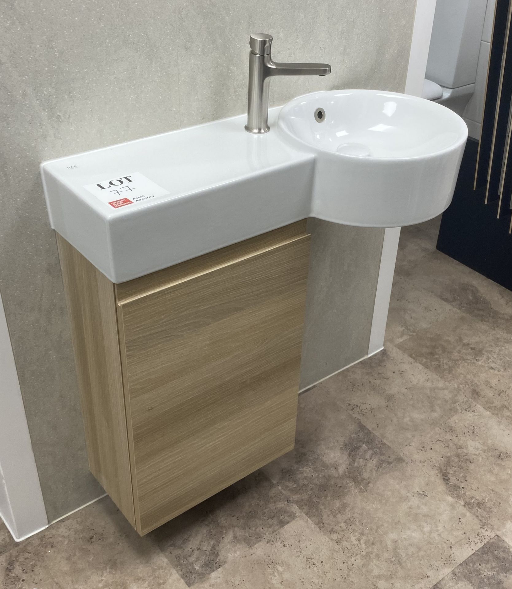 Rak Ceramics single sink basin unit and mixer tap with wood effect laminate under counter cupboard